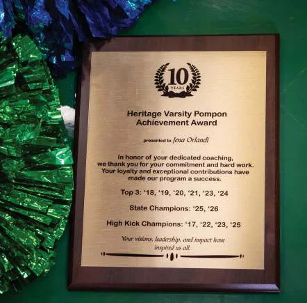 Heritage Varsity Pompon ten-year coaching achievement award for Jena Orlandi.