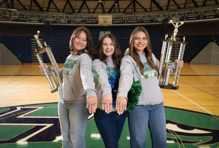 Jena Orlandi, center, with assistant coaches Niyah Martinez and Jess Ramos.